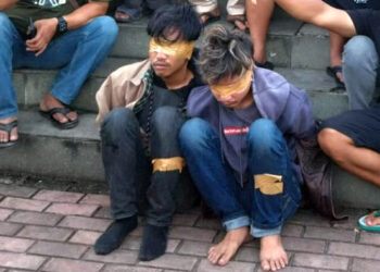 Dua pelaku pembunuhan terhadap juru parkir di Kecamatan Cimanggung, Sumedang yang berhasil ditangkap polisi