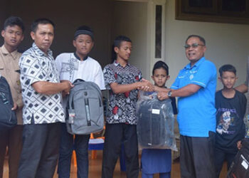 Pemerintah Desa Harapan Baru, Kecamatan Mandau, Kabupaten Bengkalis menyantuni puluhan anak yatim dan keluarga pra sejahtera. (Foto: Istimewa)